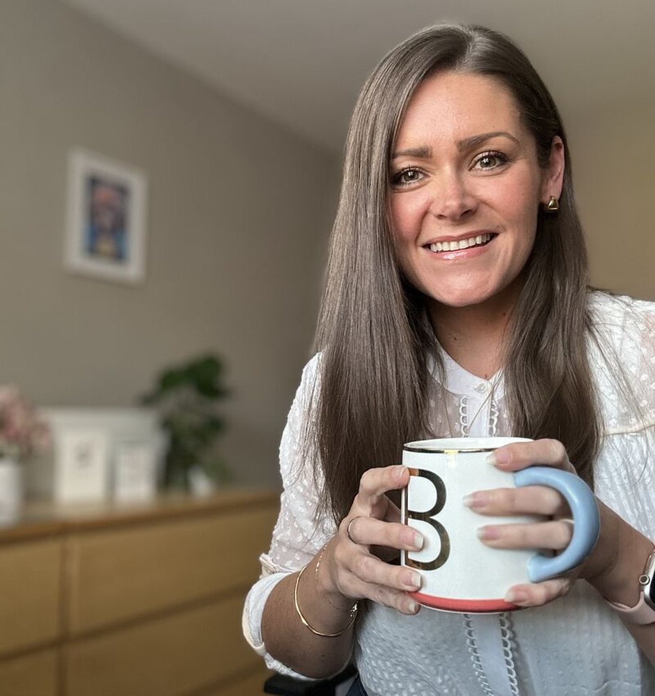 Britt Brown at home with a cup of tea